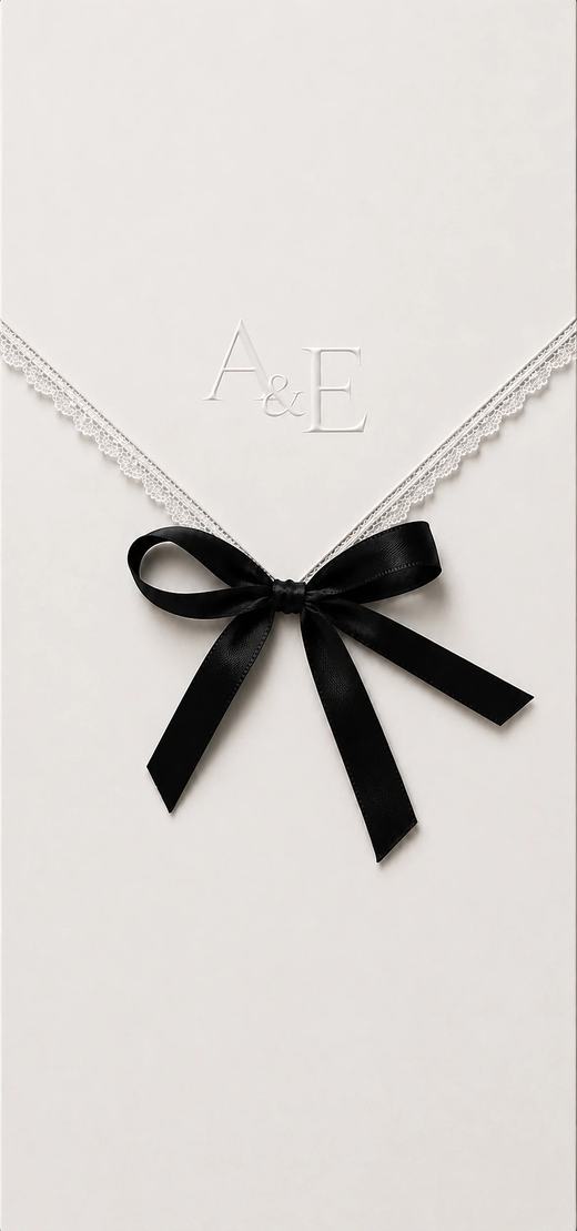 The Noir Collection digital wedding invitation — ivory envelope with a monogram and black silk bow